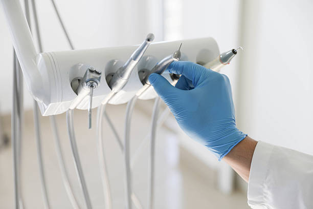 Professional Emergency Dentist technician working in Biscayne Park, FL